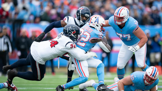 Tennessee Titans running back Tyjae Spears (32) runs against the Houston Texans during their game at Nissan Stadium in Nashville, Tenn., Sunday, Dec. 17, 2023